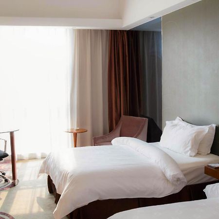 จินเจียง เมโทรโปโล เจิ้นเจียง เรลเวย์สเตชั่น ว่านต้าพลาซา Hotel ภายนอก รูปภาพ