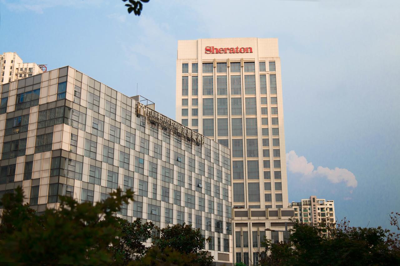 จินเจียง เมโทรโปโล เจิ้นเจียง เรลเวย์สเตชั่น ว่านต้าพลาซา Hotel ภายนอก รูปภาพ